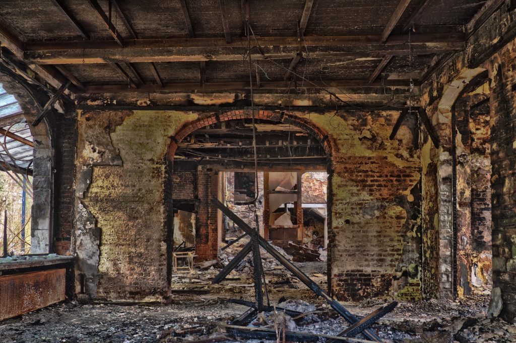 A photo of the dilapidated interior of a building.
