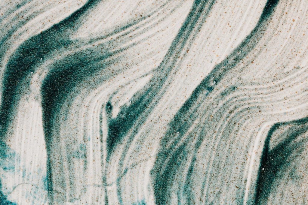 Abstract art of green-white wavy vertical lines