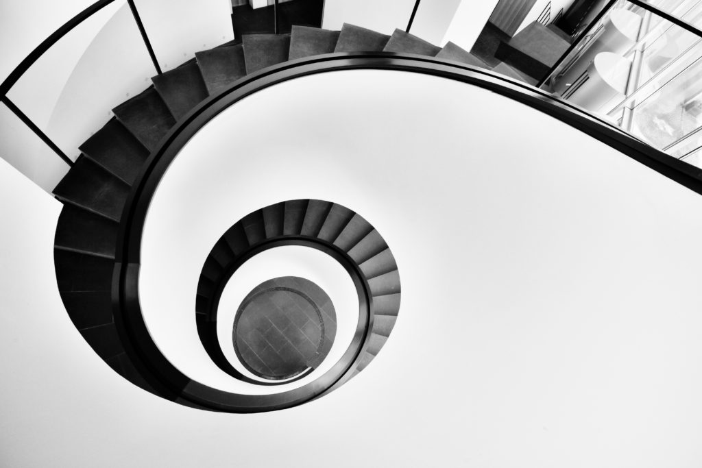 Black-and-white spiraling staircase