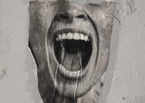 screaming face trapped in cement