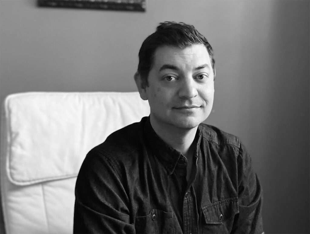 Black and white portrait of author Kevin Wilson